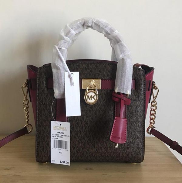 MK純?cè)?017新款 原廠材質(zhì)拼皮鎖頭笑臉包