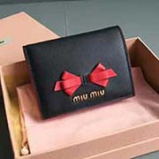 MIUMIU 口袋小錢包 pocket wallet 專柜新款小錢夾超美蝴蝶結 里外精良拼色搭配 5MV204 里外都是進口高等哈雷小牛皮 內壓197A 百元鈔銀行卡硬幣零錢通通可以收入其中 8 11