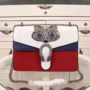 gucci酒神系列標志性的雙虎頭