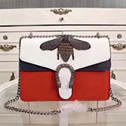 gucci酒神系列標志性的雙虎頭