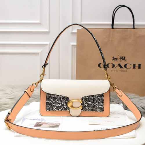 今年超級火的蔻馳女款包，蛇皮小號拼色酒