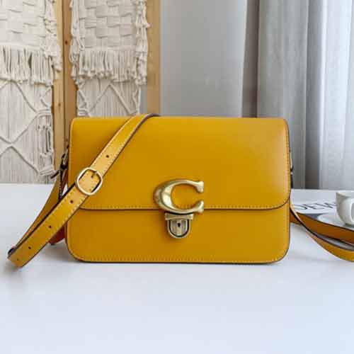 Coach Studio包袋：經典標志推鈕封口，現代風尚，便攜實用！